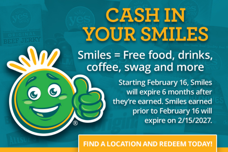 A green smiling mascot gives a thumbs up next to text promoting a rewards program called “Smiles,” offering free food and more. Details about points expiration and a yellow button to find locations are shown.