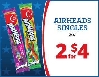 Two Airheads Xtremes candy packs are shown next to a sign that reads, AIRHEADS SINGLES 2oz, 2 for $4, on a blue and red background with stars.