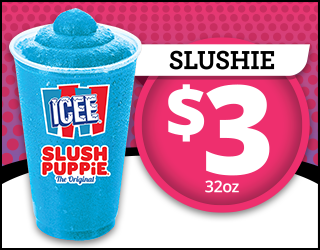 A large blue Icee Slush Puppie slushie in a clear cup is shown next to a sign reading SLUSHIE $3 32oz on a pink dotted background.